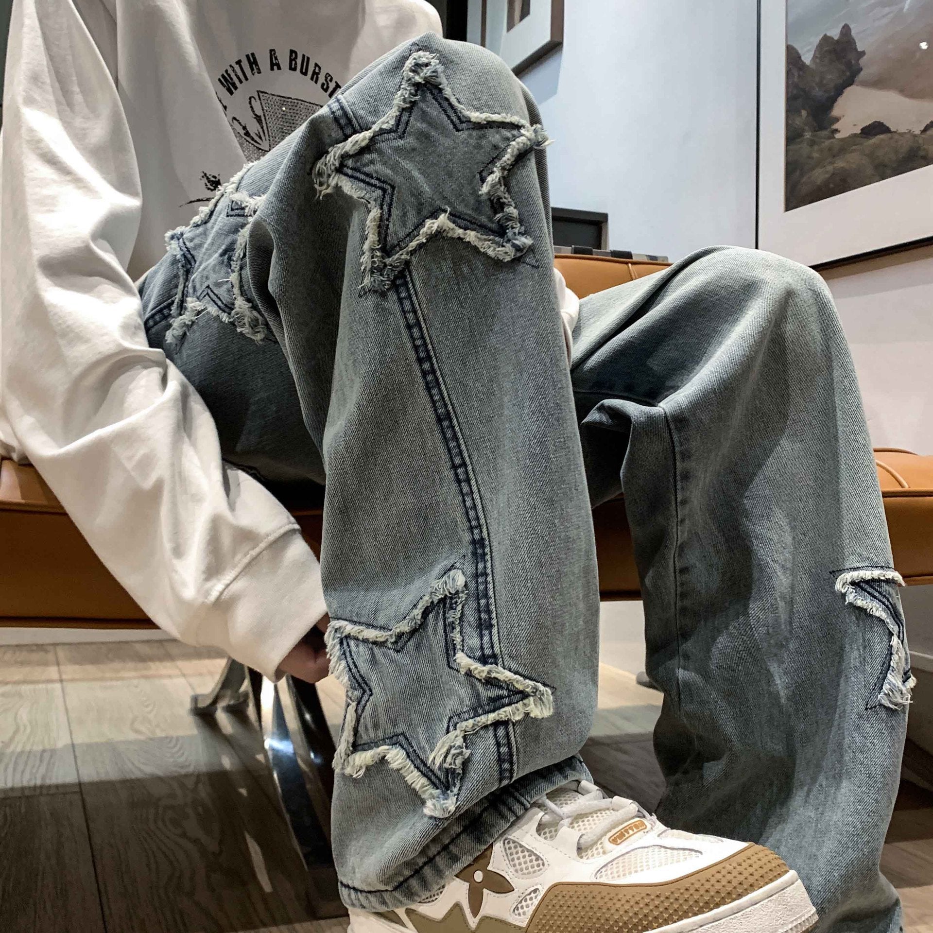 Pantalones holgados rectos con estrellas de hombre