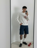 Playera de manga larga con estampado floral y cuello redondo