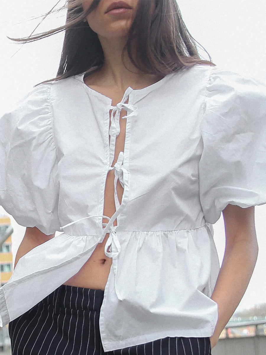 Top holgado de manga corta con cuello redondo y cordones de algodón