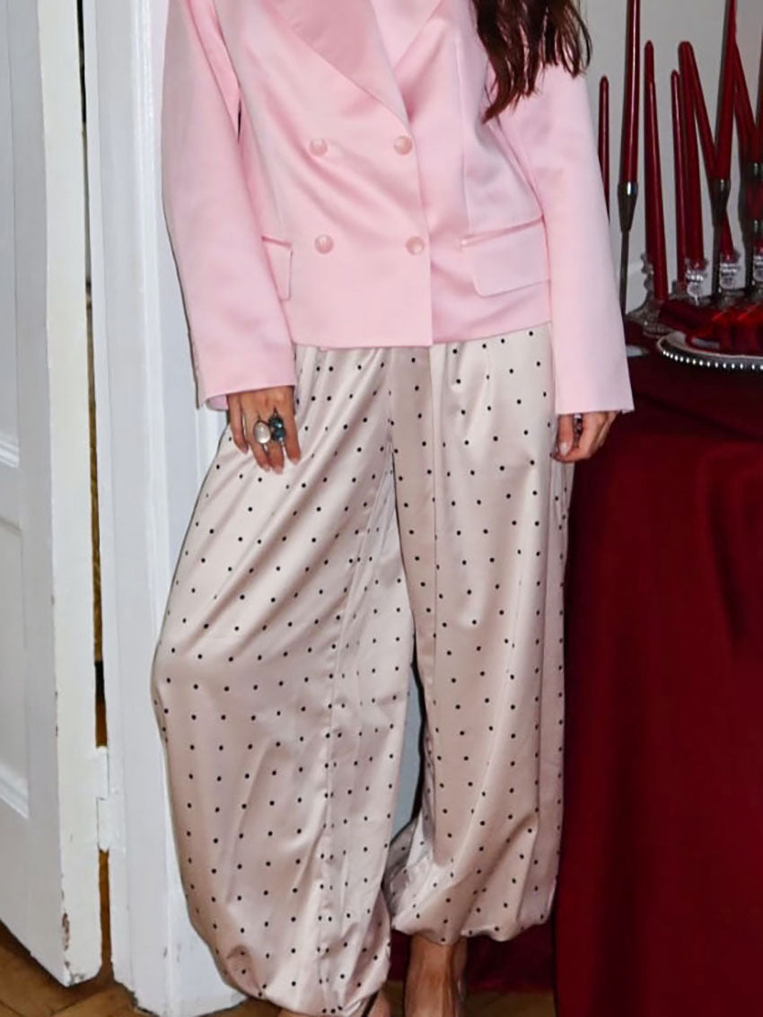 Pantalones de pierna ancha con puños de satén de lunares